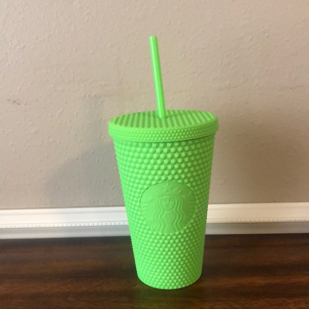 Starbucks 16oz lime green Tumbler with lid and straw.